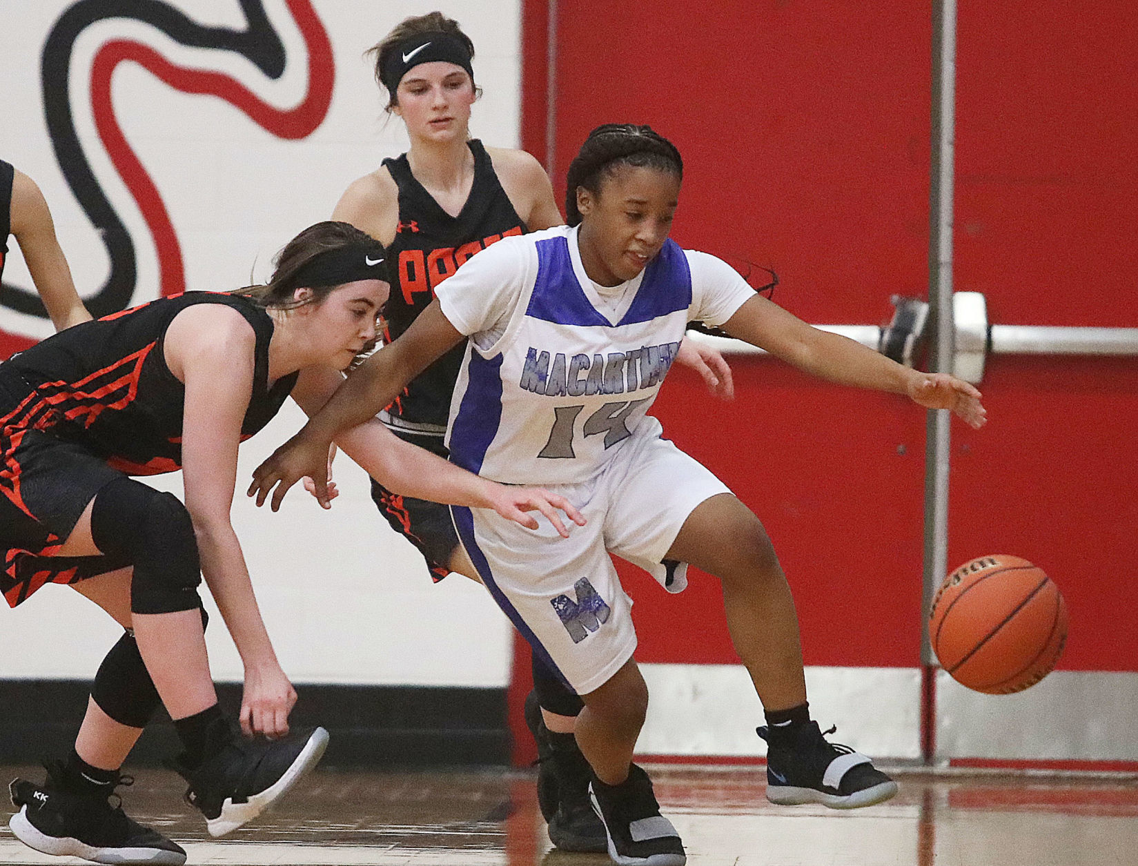 Second team — Taya Davis (So., G), MacArthur